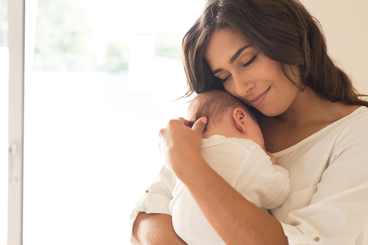 woman with newborn baby woman with newborn baby